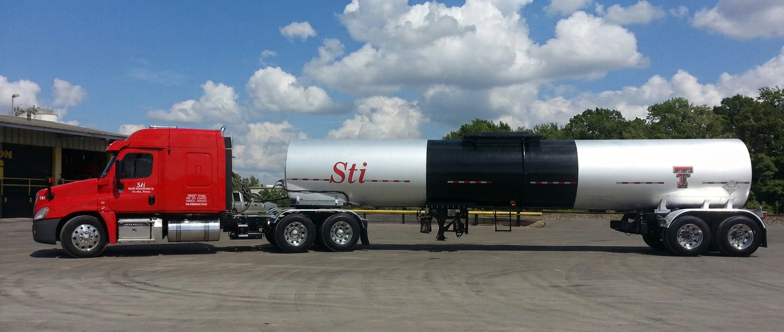 Skinner Transportation red tractor and silver tanker trailer shown in full profile